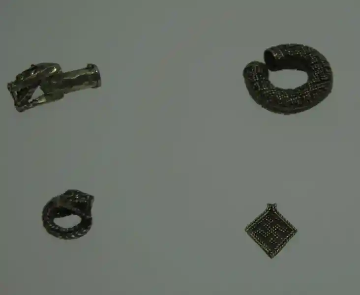 Swastika on a gold pendant.